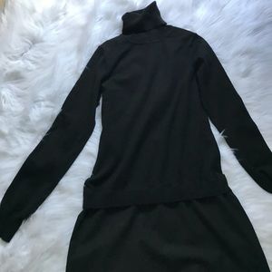 black sweater dress with attached mini skirt